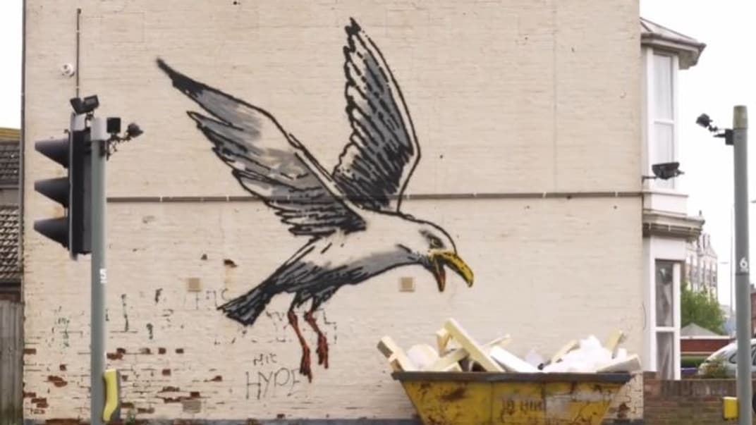 Мурал вуличного художника Бенксі на стіні будинку в місті Лоустофт 