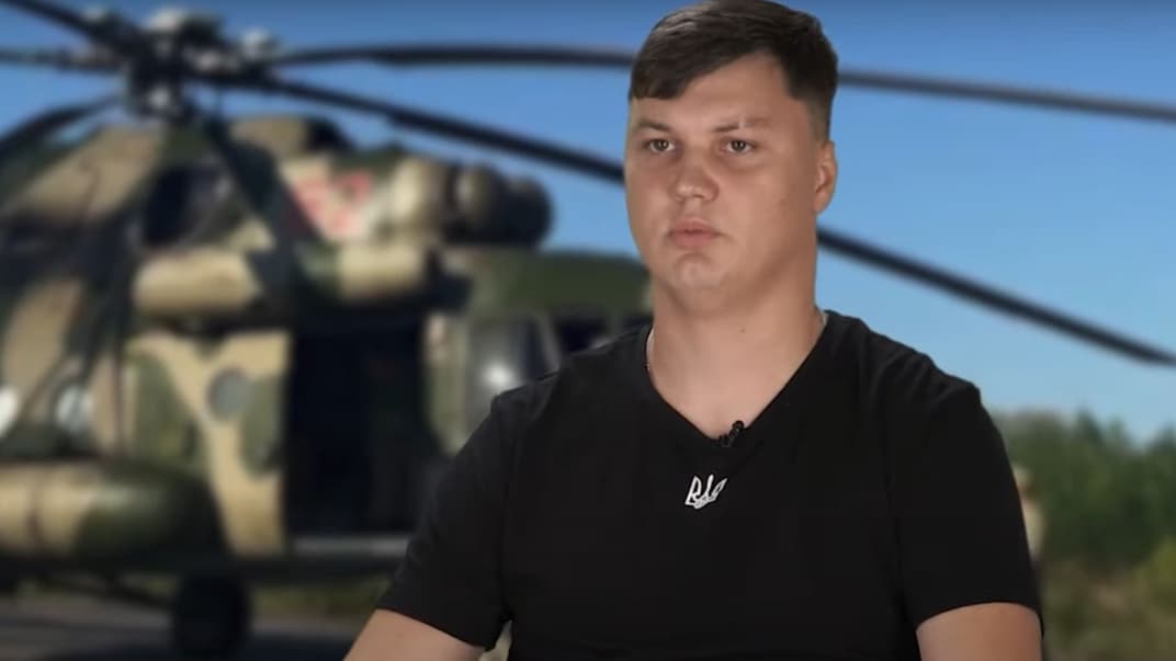 російський пілот Максим Кузьмінов 