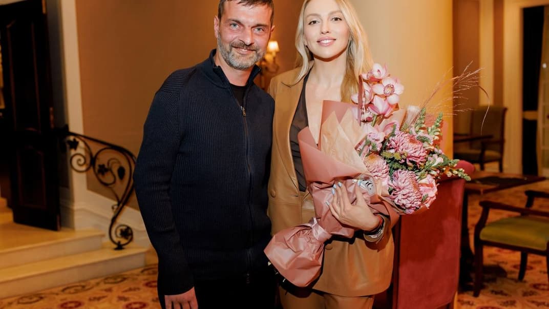 Защитник Мариуполя Михаил Дианов и певица Оля Полякова