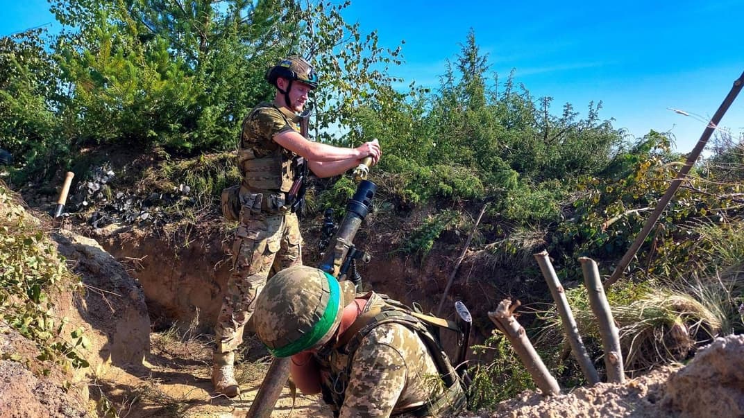 Українські військовослужбовці на полі бою