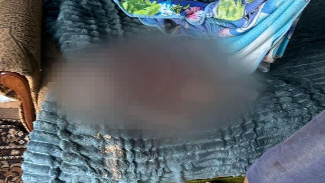 Тело годовалого Дмитрика, погибшего от удара русского дрона в Херсонской области