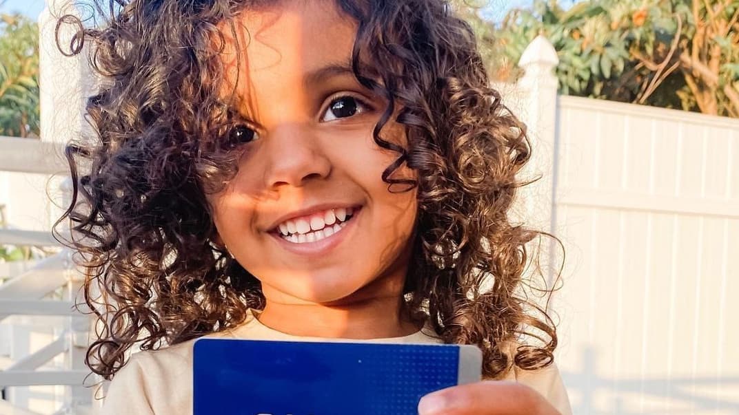 Кеші Квест із посвідченням членкині Mensa, найстарішої та найбільшої у світі організації для людей із високим рівнем IQ