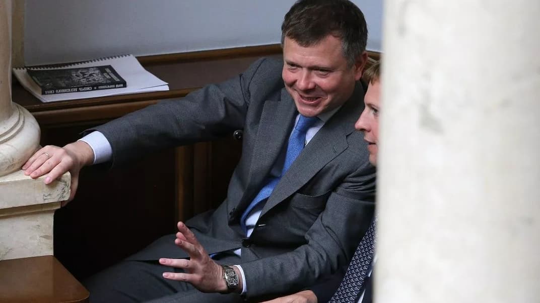 Колишні народні депутати Костянтин Жеваго та Віталій Хомутинник під час позачергового засідання Верховної Ради, Київ, 22 травня 2019 року