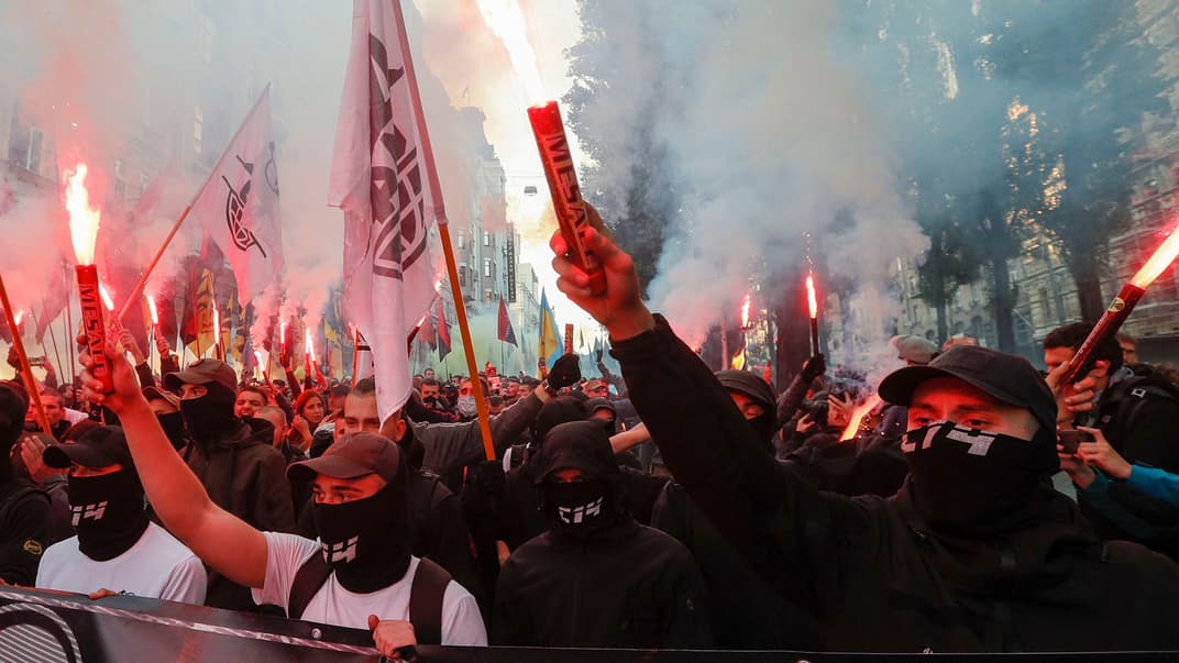 Члени організації С14 під час смолоскипної ходи в річницю створення Української повстанської армії, Київ, 14 жовтня 2018 року