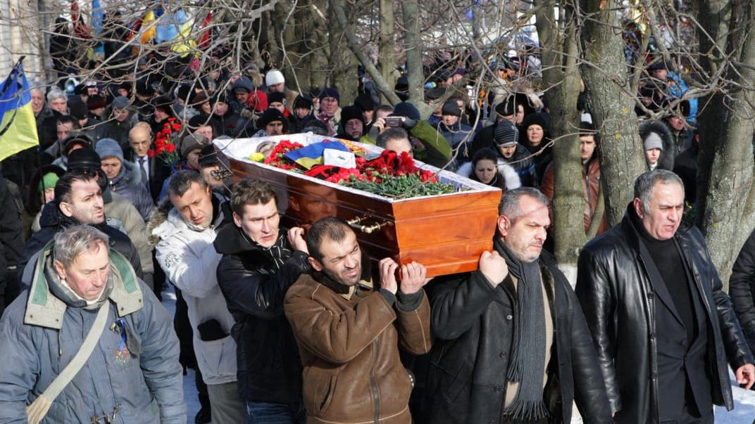 Похорон активіста євромайдану Сергія Нігояна, який був застрелений у Києві 22 січня 2014 року під час сутичок на вулиці Грушевського, село Березнуватівка Солонянського району Дніпропетровської області, 26 січня 2014 року. 