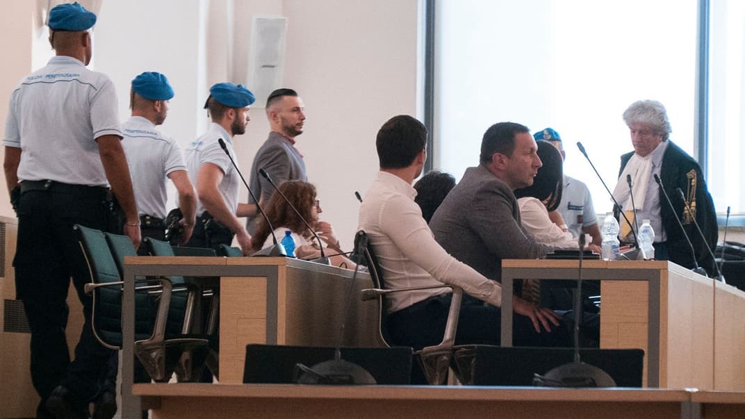 Заседание суда по делу нацгвардейца Виталия Маркива (в центре), Павия, Италия, 12 июля 2019 года