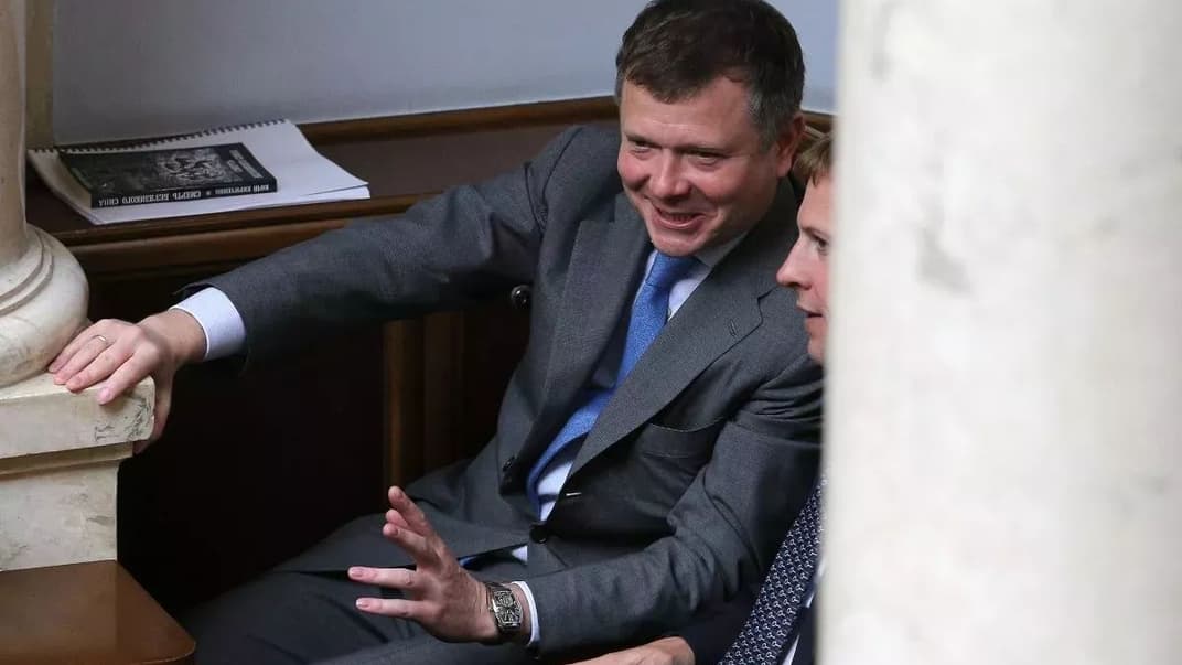 Колишні народні депутати Костянтин Жеваго та Віталій Хомутинник під час позачергового засідання Верховної Ради, Київ, 22 травня 2019 року