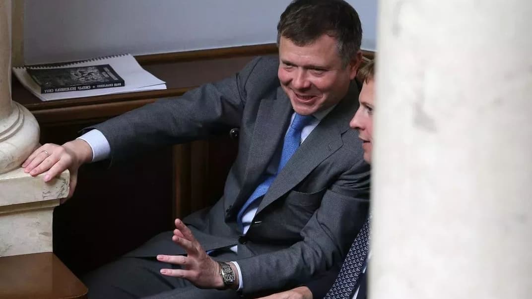 Колишні народні депутати Костянтин Жеваго та Віталій Хомутинник під час позачергового засідання Верховної Ради, Київ, 22 травня 2019 року