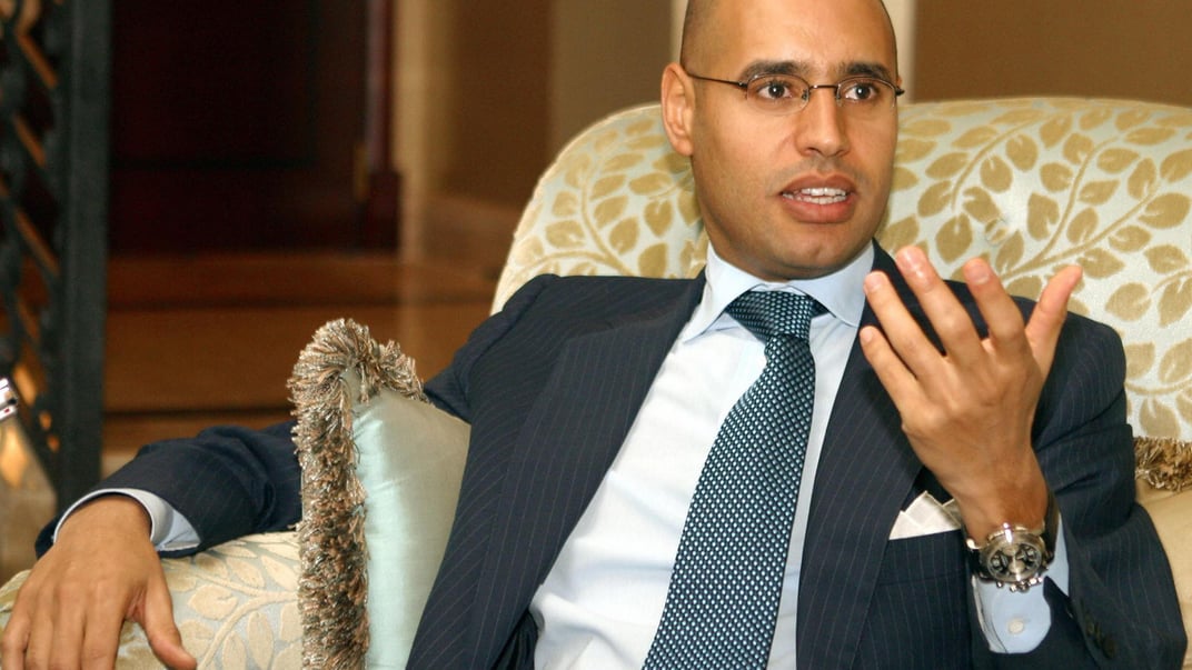 Саїф уль-Іслам Каддафі, син лівійського лідера Муамера Каддафі, виступає перед пресою в Досі, 21 березня 2004 року