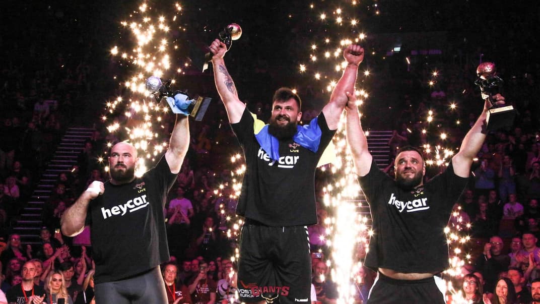 Павел Кордияка, Алексей Новиков и Айварс Шмаукстелис на подиуме