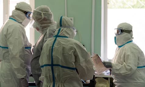 Sweat, Disinfectants, and Rubber Suits: Exclusive Report from Ukraine's Most Coronavirus-Ridden Region
