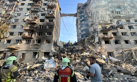 Russian drone and missile strikes kill at least 14 in Kyiv, hit apartment blocks