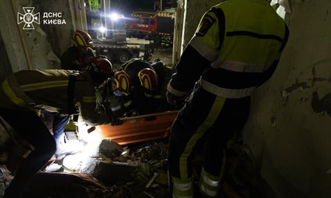 Rescuers at the site of the Russian attack Rescuers at the site of the Russian attack