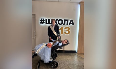 Випускниця львівської школи Софія та її партнер по танцю Олександр Випускниця львівської школи Софія та її партнер по танцю Олександр