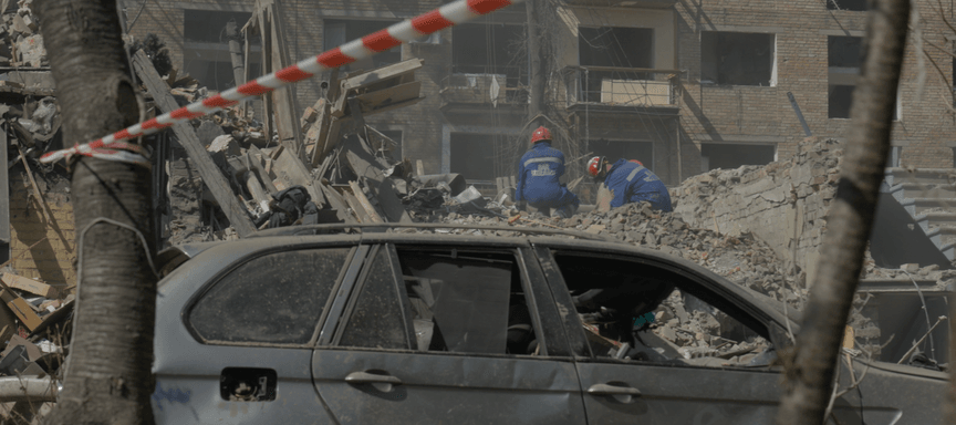 Rescuers dismantle the rubble at the site of a Russian missile strike, Kyiv