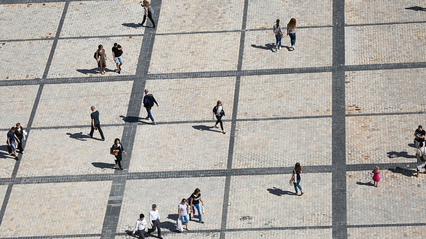 People walk on Sofiiska Square in Kyiv, Ukraine on August 31, 2016.