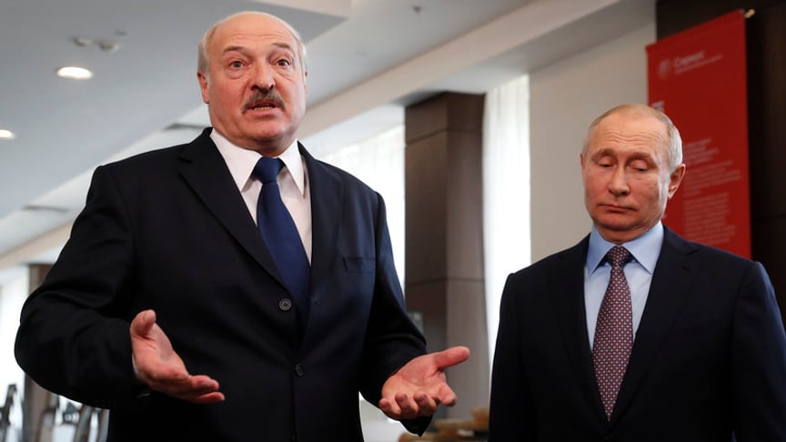 Belarus President Alexander Lukashenko (L) and Russian President Vladimir Putin (R) speak to journalists during their meeting at the Sirius educational center in the Black sea resort of Sochi, Russia on February 15, 2019.