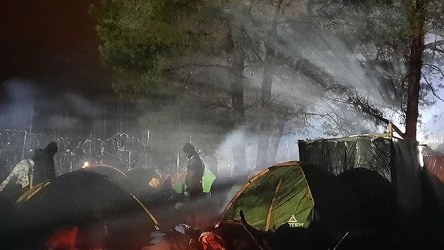 Вид на наметовий табір, встановлений мігрантами з Близького Сходу та інших країн, які збираються на білорусько-польському кордоні поблизу Гродно, Білорусь