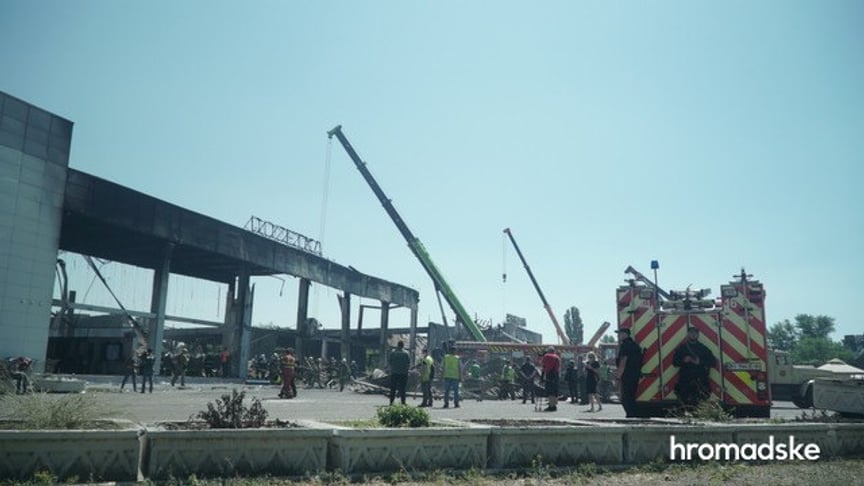 Consequences of Russian attack on shopping mall in Kremenchuk