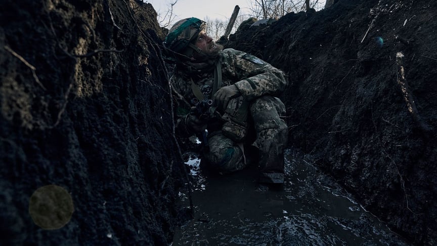 Ukrainian soldier in a trench on the front line near Bakhmut, Donetsk Oblast, March 5, 2023 