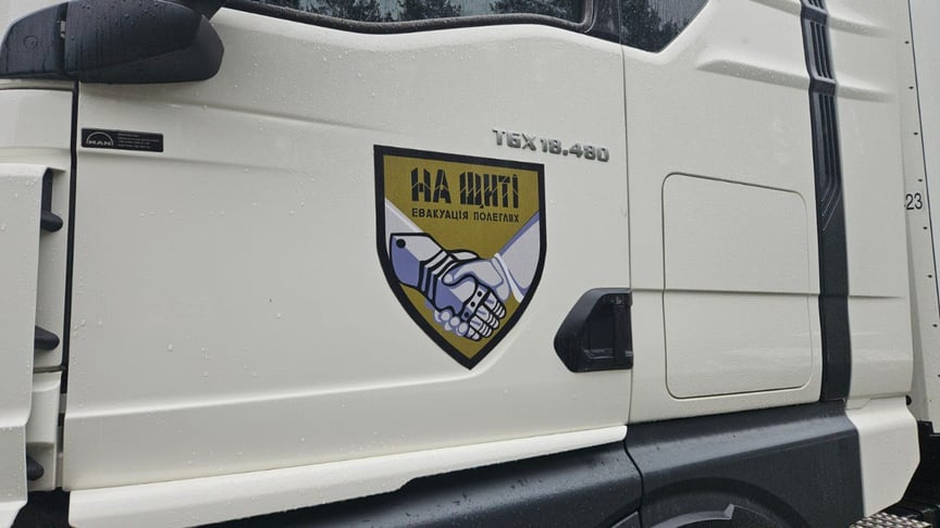 Лого організації, що займається евакуацією полеглих