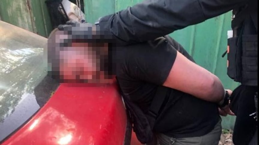 The law enforcement officers detain the commander of the Kyiv Territorial Defense company, who is suspected of selling weapons