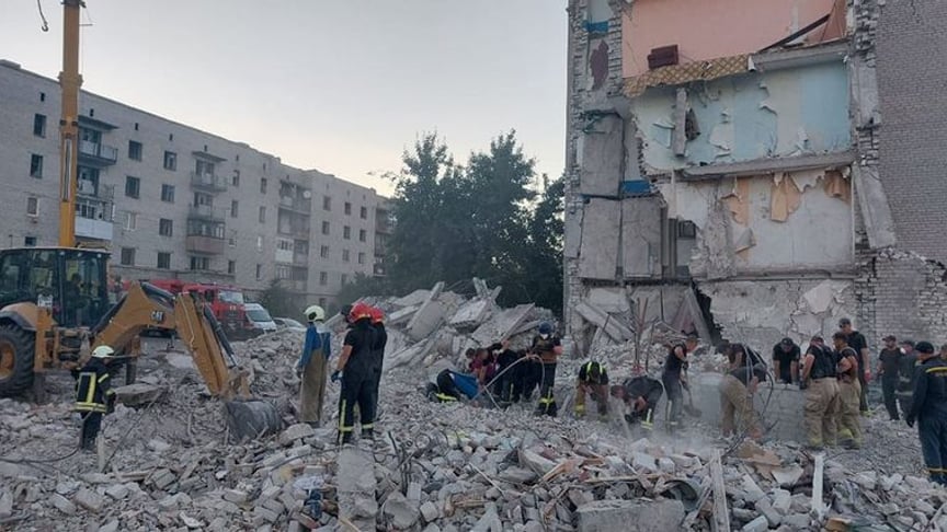 Dismantling the rubble of a building after being hit by Russian missiles, Chasiv Yar, July 12, 2022