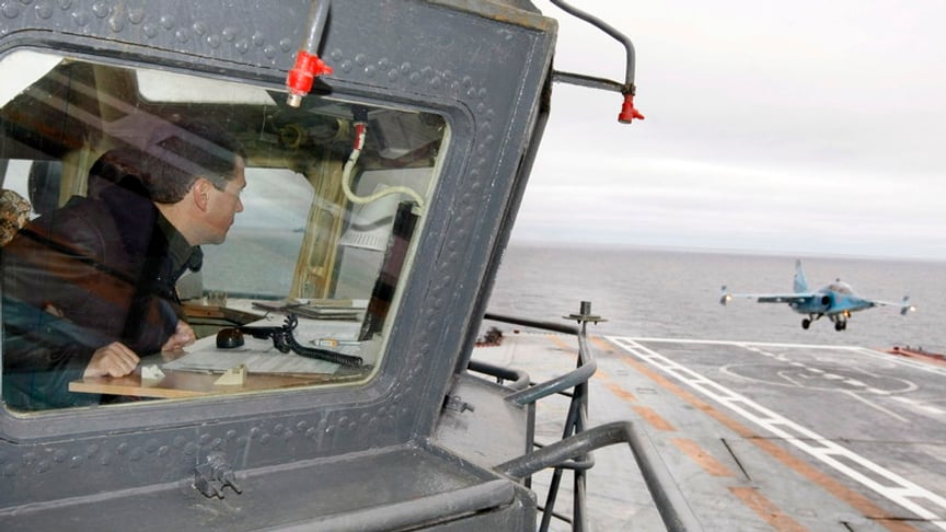 The then Russian President and Supreme Commander Dmitry Medvedev visits the aircraft carrying heavy cruiser 'Admiral N. Kuznetsov' in the Barents Sea, Russia on October 11, 2008. Medvedev joined the Northern Fleet to observe military exercises in the Barents Sea including a full-range test of the Sineva ballistic missile.
