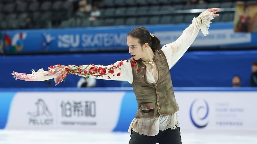 росіянин Петро Гуменник під час змагань у Пекіні росіянин Петро Гуменник під час змагань у Пекіні