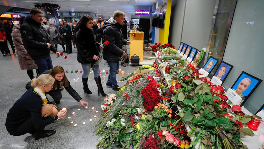 Relatives, colleagues, and friends of crew members of the Ukraine International Airlines Flight PS752 which crashed near Tehran lay flowers and light candles at Boryspil International Airport in Kyiv, Ukraine on January 8, 2020.