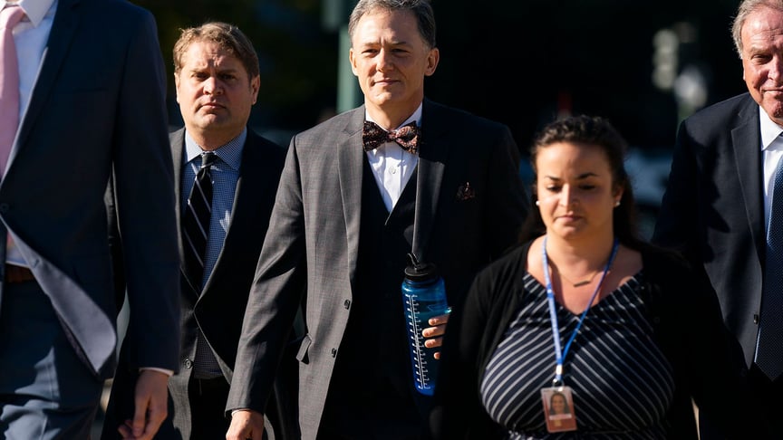 Deputy Assistant Secretary of State George Kent (C) on his way to testify at the US Congress in Washington D.C., US on October 15, 2019.