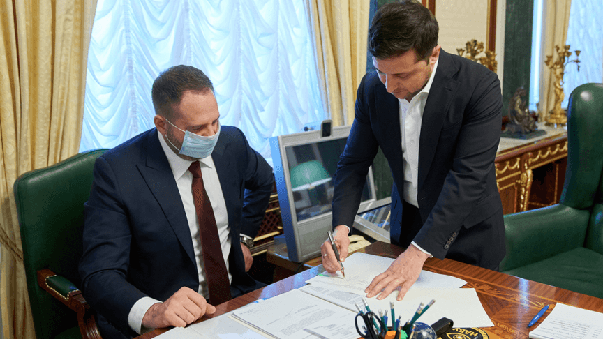 Ukrainian President Volodymyr Zelenskyy signs the bill on the agricultural land market into law.
