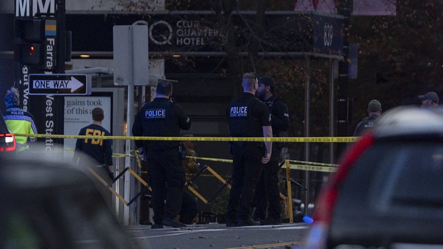 Поліціянти працюють на місці стрілянини у Вашингтоні, унаслідок якої загинули двоє нацгвардійців, 26 листопада