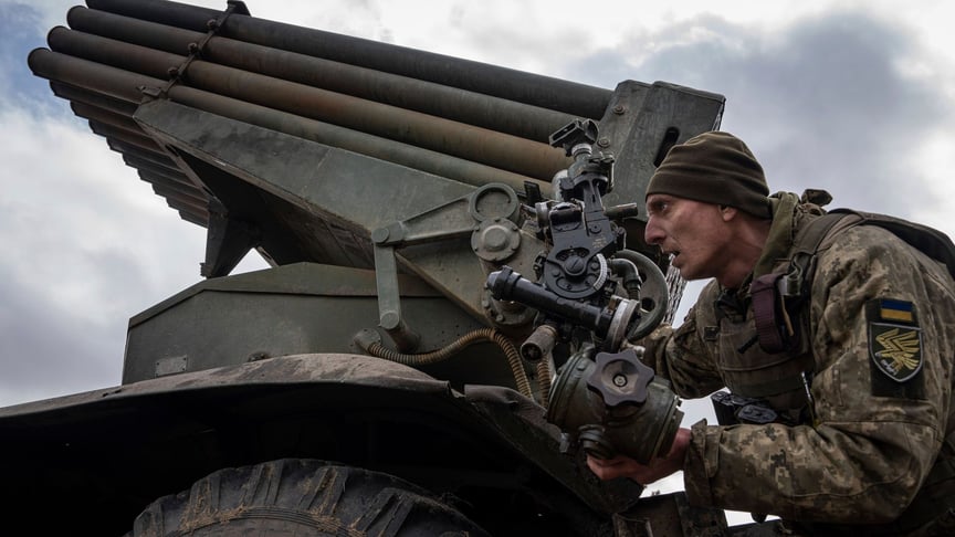 Ukrainian paratrooper fires at Russian positions on the front line near Kreminna, Luhansk Oblast, March 9, 2023