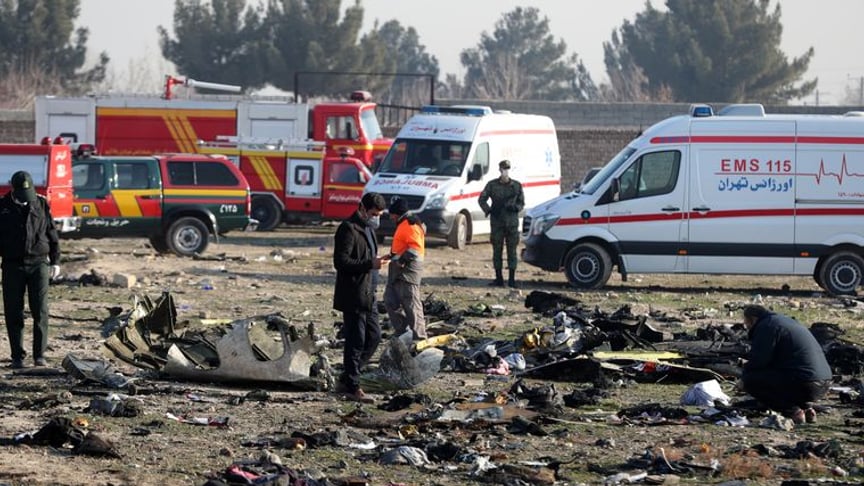 Red Cross volunteers on the site of the crash of flight PS752. The site has since been cleaned by Iranian authorities. Tehran, Iran, January 8, 2020.