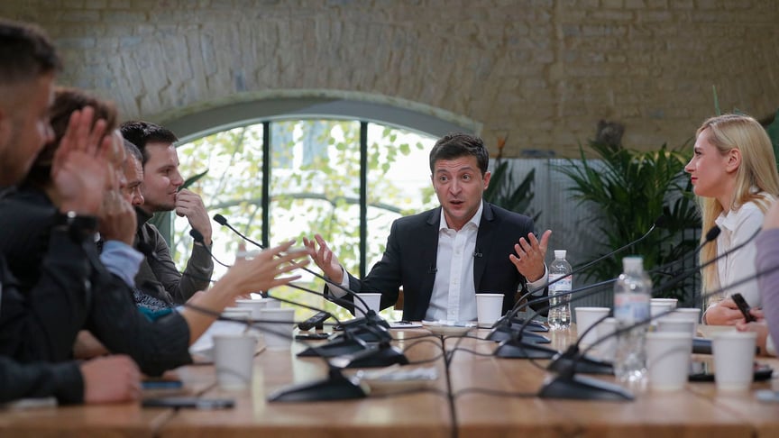 President of Ukraine Volodymyr Zelenskyy speaks to journalists at Kyiv's central Food Market on October 10.