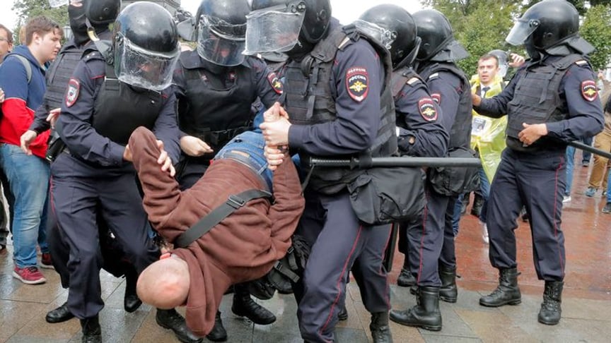 Police detain opposition protesters in central Moscow, Russia, August 3, 2019
Photo: EPA-EFE / MAXIM SHIPENKOV