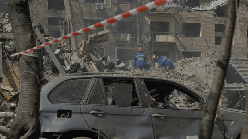 Rescuers dismantle the rubble at the site of a Russian missile strike, Kyiv Rescuers dismantle the rubble at the site of a Russian missile strike, Kyiv