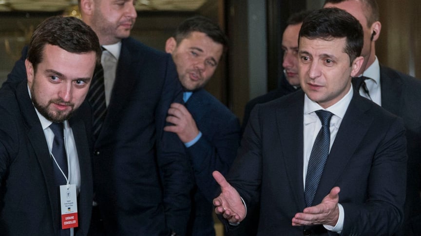 Deputy Head of the Presidential Office Kyrylo Tymoshenko (left), the new head of the Office Andriy Yermak, Ex-Head of the Office Andriy Bohdan, and President Volodymyr Zelenskyy (right) answering questions by journalists after the Normandy talks in Paris, France, December 7.