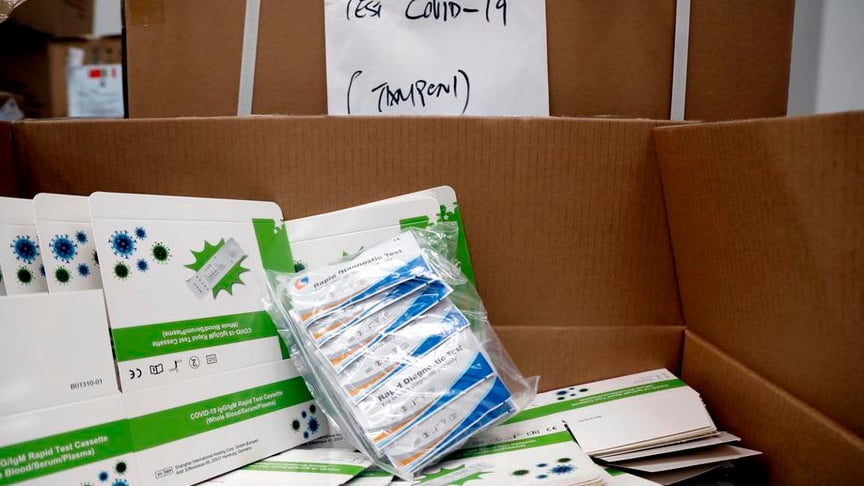 Covid-19 test kits are seen at the Regional Emergency Emergency Company AREU where boxes with supplies donated by China, containing medical equipment and personal protection devices for the whole of Lombardy, arrived at a storage warehouse in Rho, outside Milan, Italy, 20 March 2020.