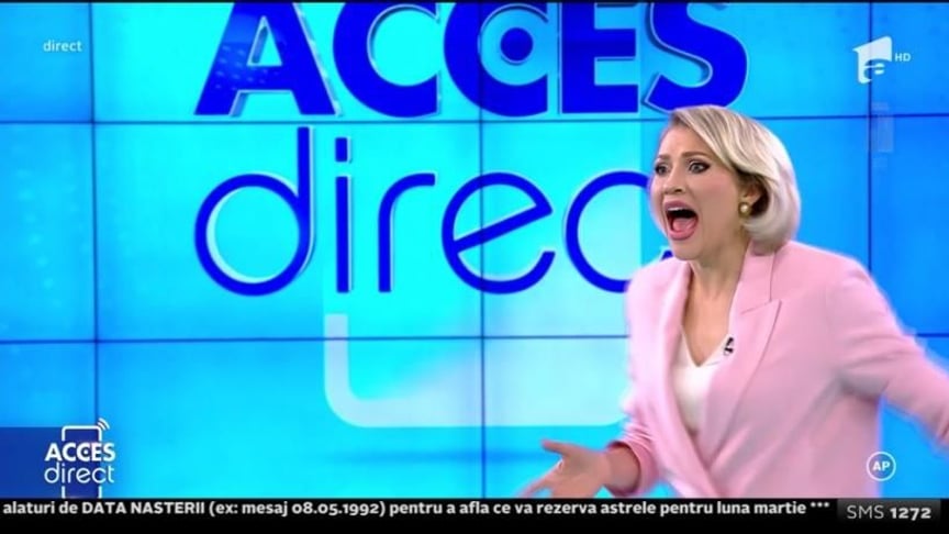 Телеведущая Мирела Вайда во время нападения на нее в студии Antena 1. Румыния, 19 марта 2020 года