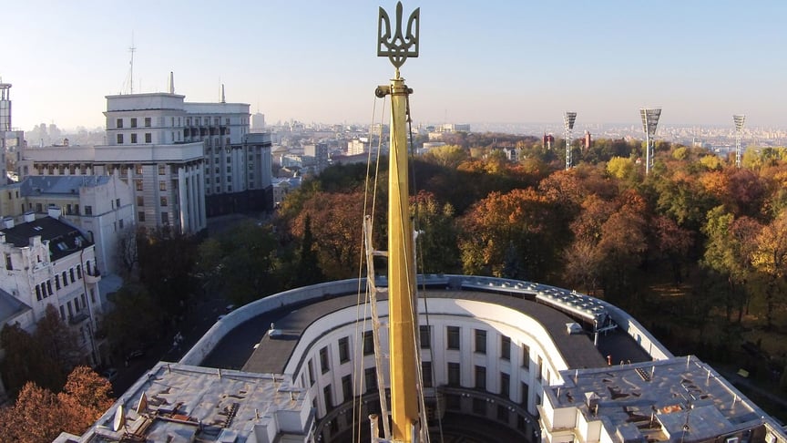 The Ukrainian trident appears over the dome of the Ukrainian parliament building on October 29, 2015.