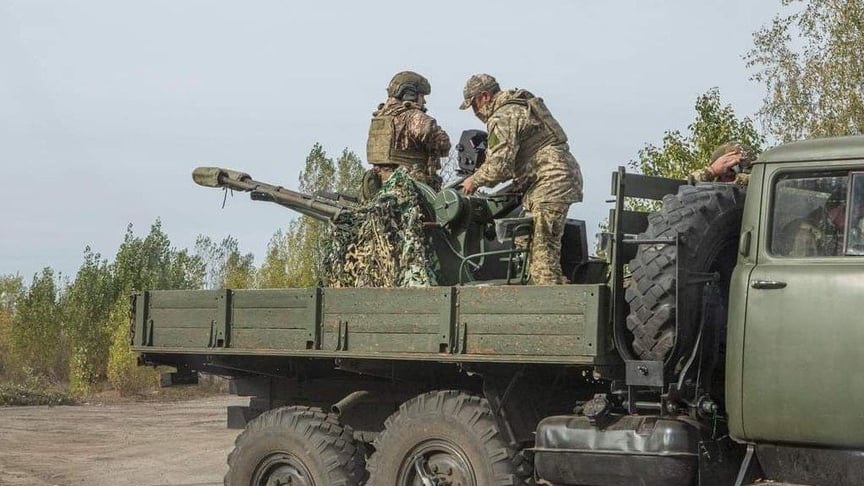 Українські військові й техніка на полі бою. Ілюстративне фото