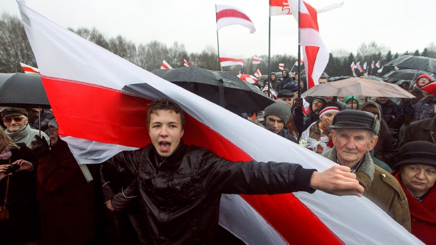 Journalist Raman Pratasevich (center) during an opposition rally in Minsk, Belarus, on March 25, 2012.