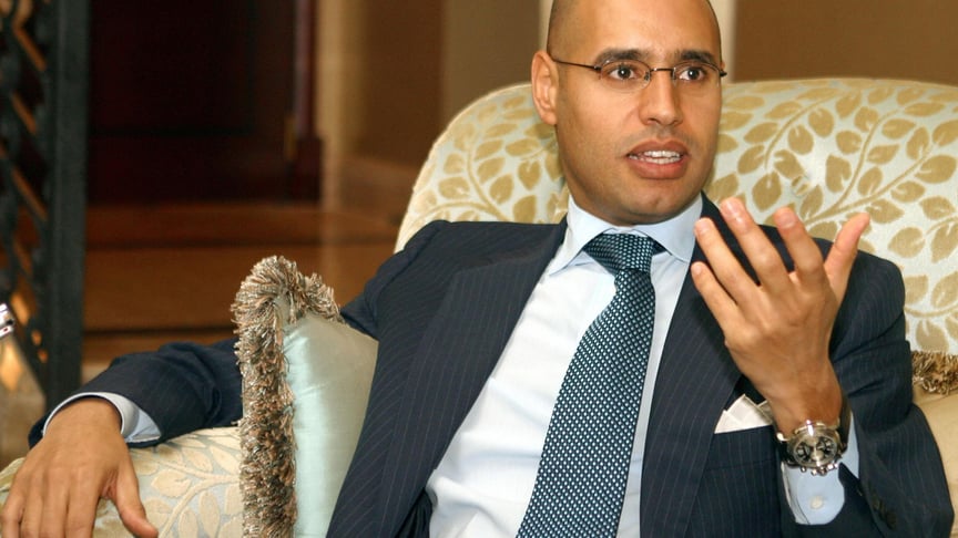 Саїф уль-Іслам Каддафі, син лівійського лідера Муамера Каддафі, виступає перед пресою в Досі, 21 березня 2004 року