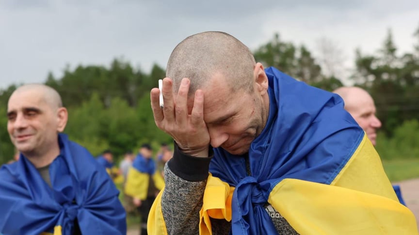 Звільнені з російського полону захисники під час обміну 19 червня 2025 року