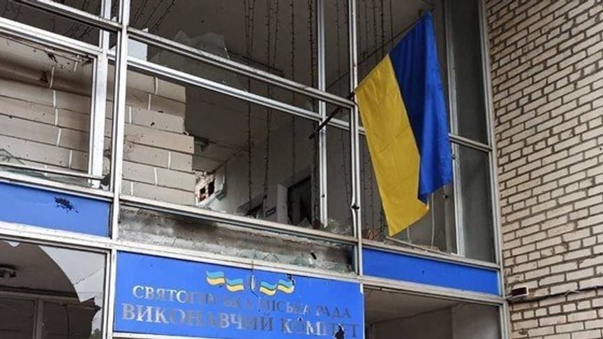 The flag of Ukraine on the city council building in Sviatohirsk